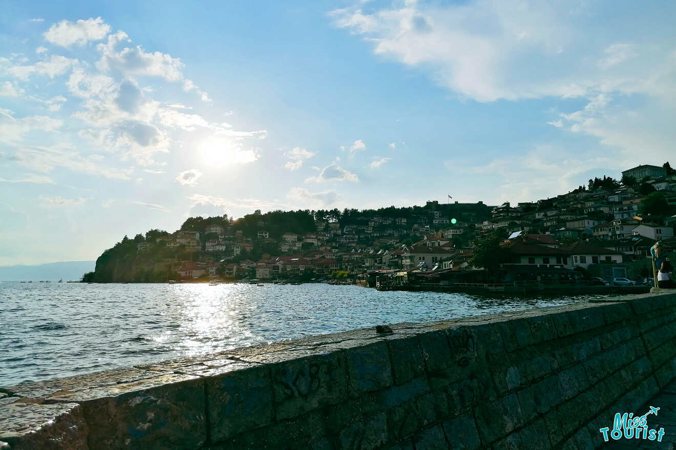 view of old city from a lake's promenade