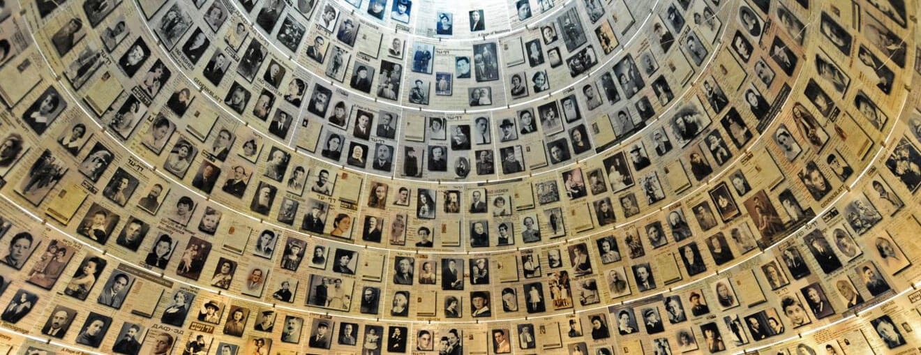 A circular ceiling displays numerous black-and-white photographs of individuals arranged in concentric rows. The images represent varied ages, genders, and expressions.