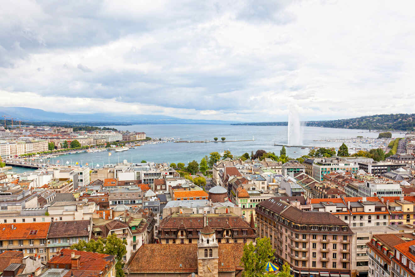 Panoramic view of Geneva skyline with Jet d'Eau fountain, showcasing the city's architecture and Lake Geneva